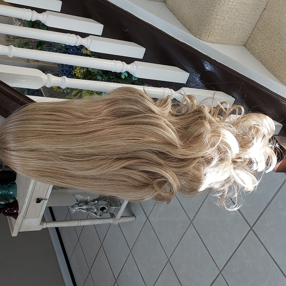 Brand new long length dirty blonde synthetic wig with loose curls